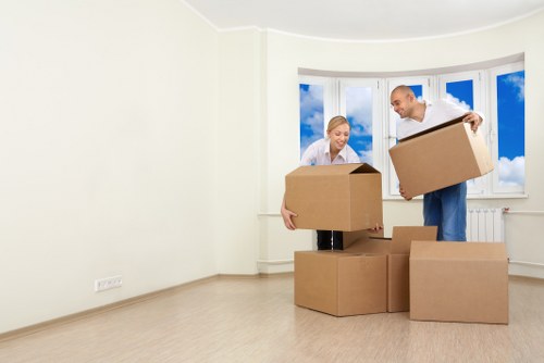Packed boxes and furniture in a storage unit