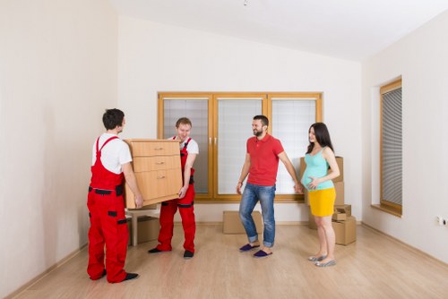 Professional movers loading a truck for storage